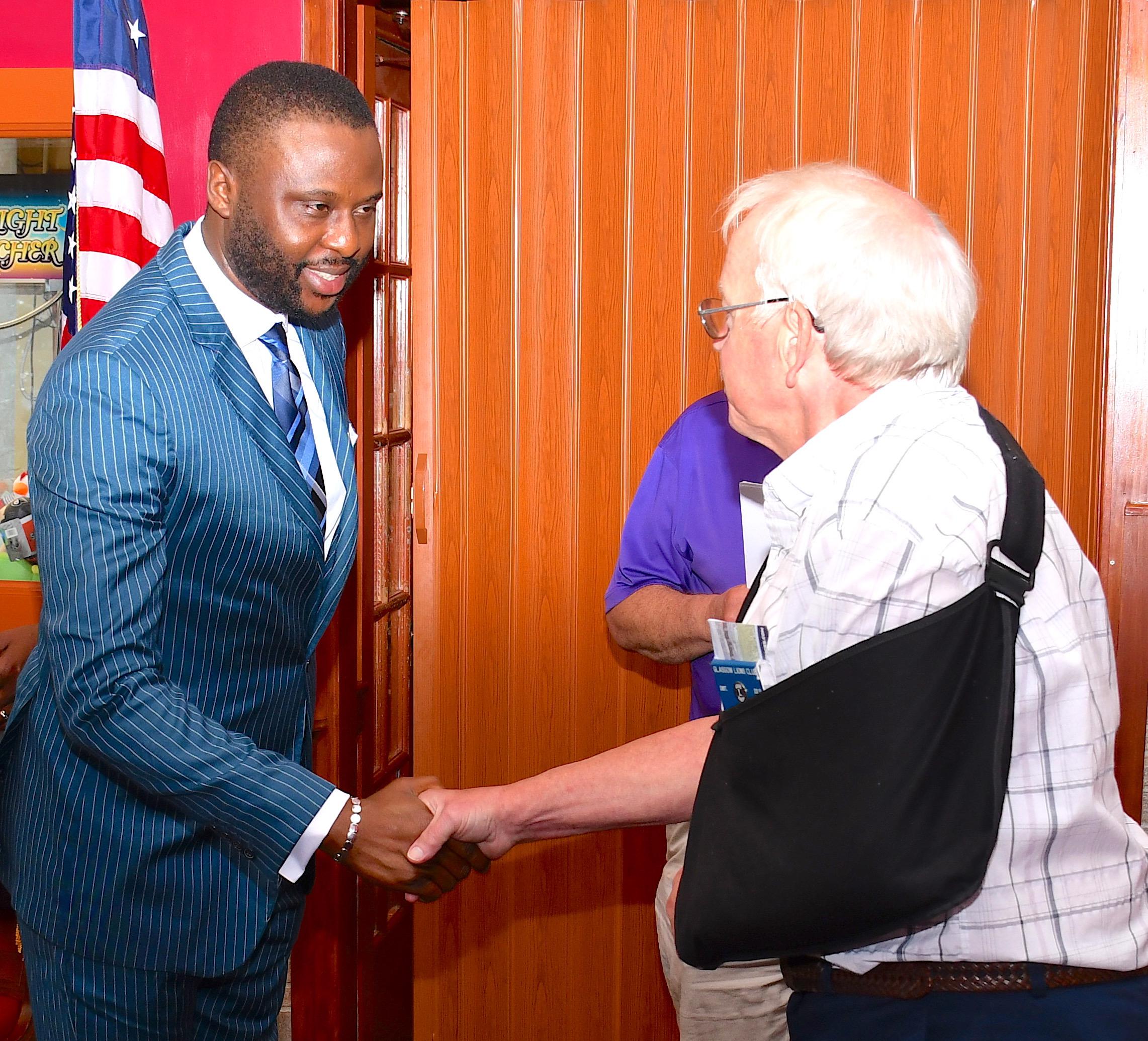 Dr. Ajilo meeting with members of the U.S. Lions Club.