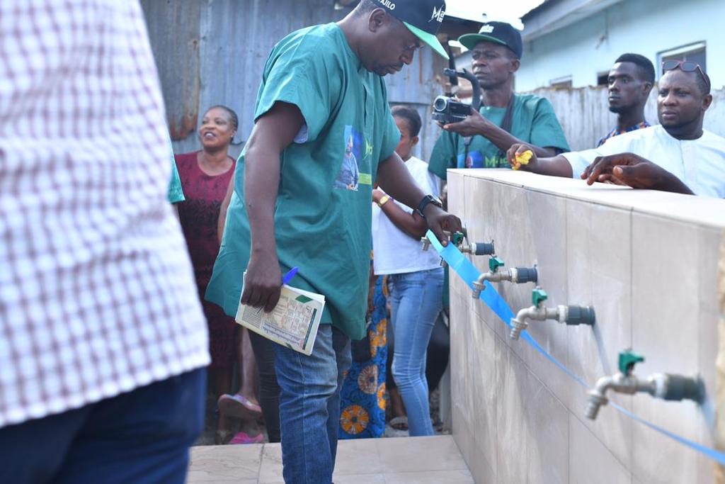 Hon. Owolabi at the commissioning of the motorised borehole.
